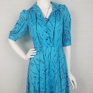 Vintage 1980's turquoise dress with black streaks